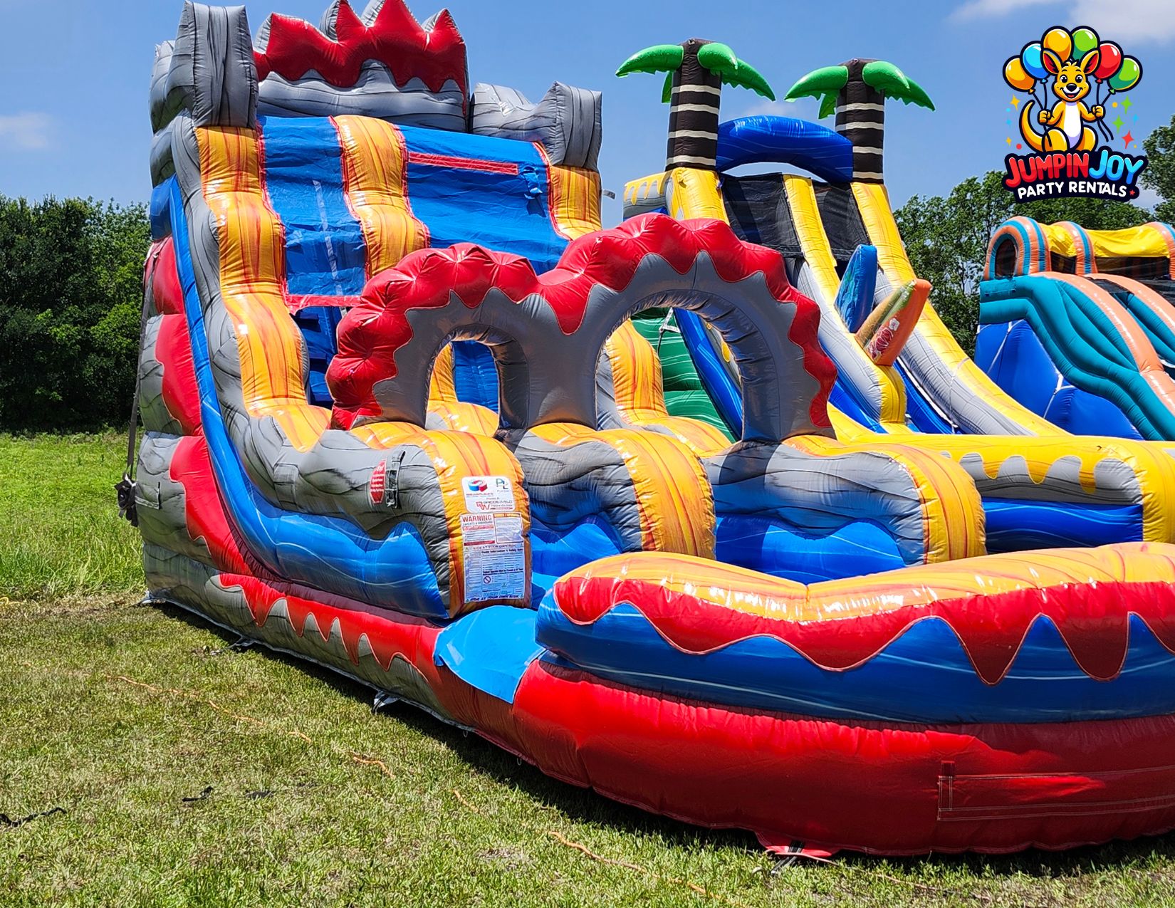 Jumpin Joy lava themed inflatable water slide rental Pflugerville TX